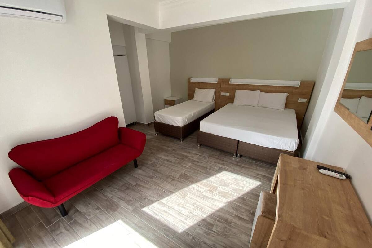 Standard Triple Room, Non Smoking, Garden View | Minibar, free WiFi, bed sheets