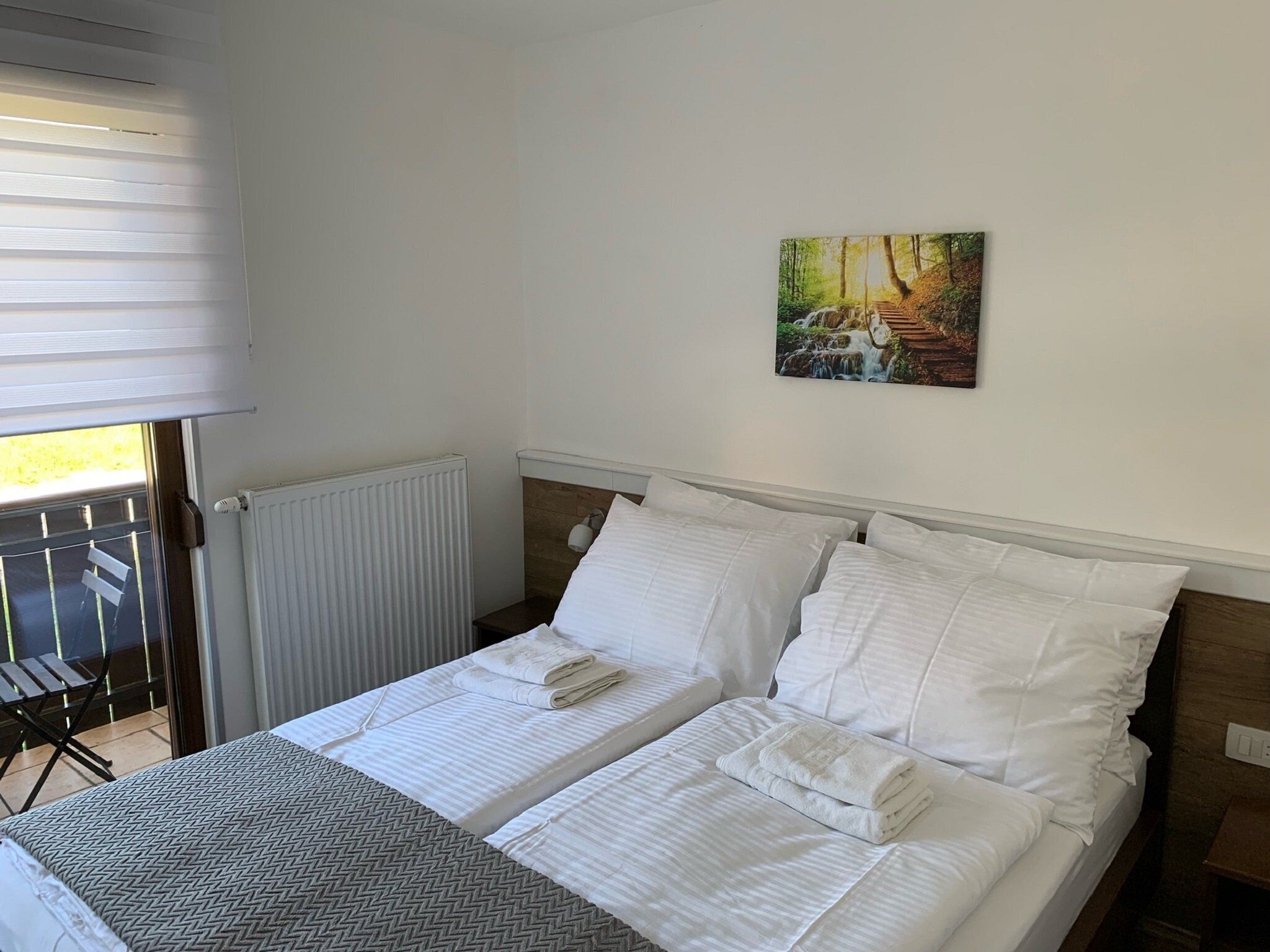 Desk, laptop workspace, free WiFi, bed sheets