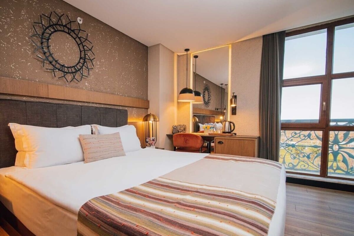 Habitación Deluxe, no fumadores, vistas al mar | Ropa de cama de alta calidad y caja fuerte