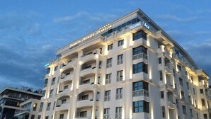 A multi-story hotel with balconies and a sign reading "Panagia Premier Trabzon". - Panagia Premier Trabzon (Trabzon)
