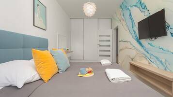 1 habitación, tabla de planchar con plancha, wifi y ropa de cama