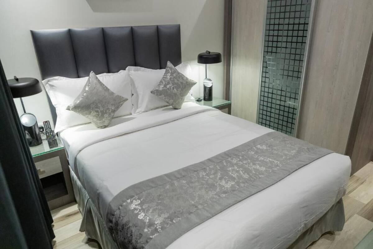 Deluxe kamer | 1 slaapkamer, een minibar, een kluis op de kamer, een laptopwerkplek
