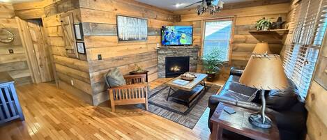 Televisión, chimenea y futbolito