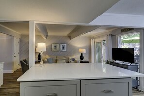 Enjoy a spacious kitchen with a central island, perfect for meal preparation and socializing.