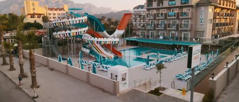 Indoor pool, outdoor pool, open 10:00 AM to 6:00 PM, pool umbrellas