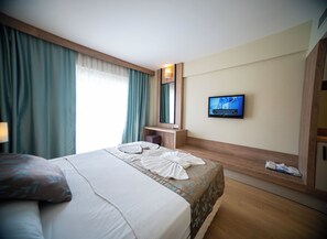 Kamar Double atau Twin Ekonomi, 1 kamar tidur, gedung tambahan | Minibar, meja kerja, tempat tidur bayi gratis, dan Wi-Fi gratis