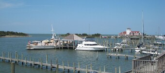 Knowing You: Harbor and sunsets views from screened porch