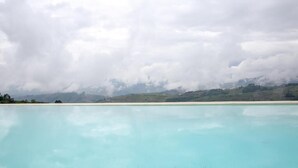 Seasonal outdoor pool, pool umbrellas, pool loungers