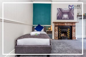 2 habitaciones, tabla de planchar con plancha, wifi y ropa de cama 