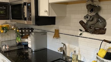 Fridge, microwave, coffee/tea maker, toaster