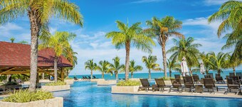 Steps from Beach Club, Pools, Restaurants, Shopping and the Pacific!!