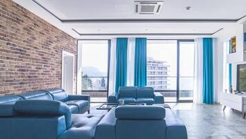 Chambre Double Deluxe | Coin séjour