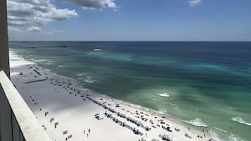 On the beach, sun-loungers, beach towels