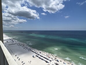 On the beach, sun loungers, beach towels
