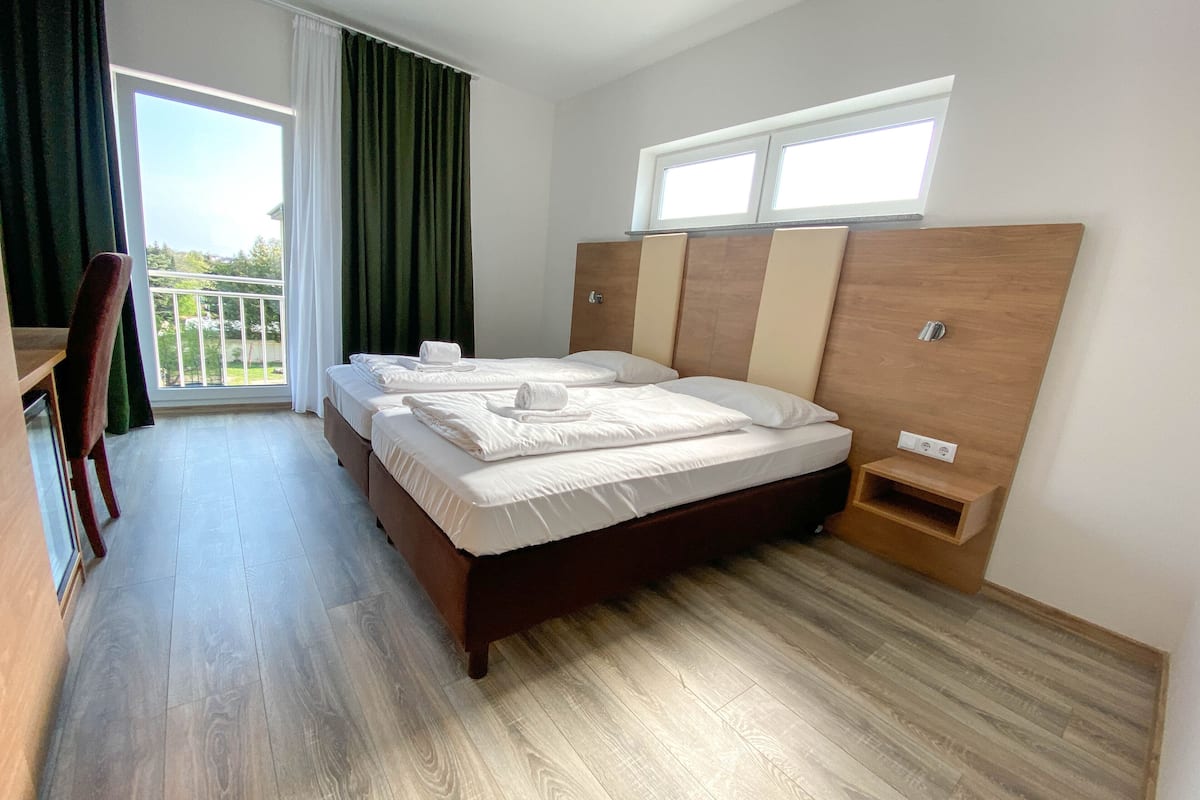 Double Room | Minibar, desk, laptop workspace, iron/ironing board