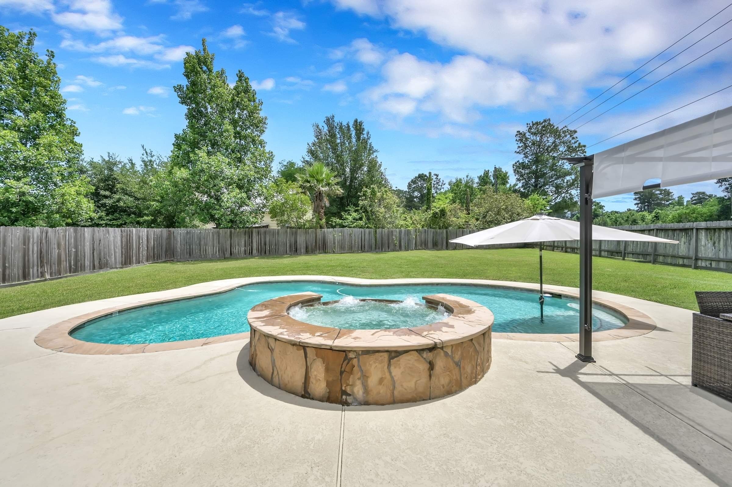 Pool home in Gated Golf Course community on Lake Conroe