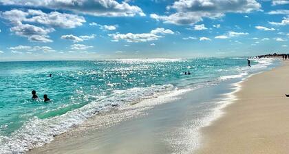 Seven Palms Waterfront - Private Dock, Heated Pool & Lanai - Walk to Beach!