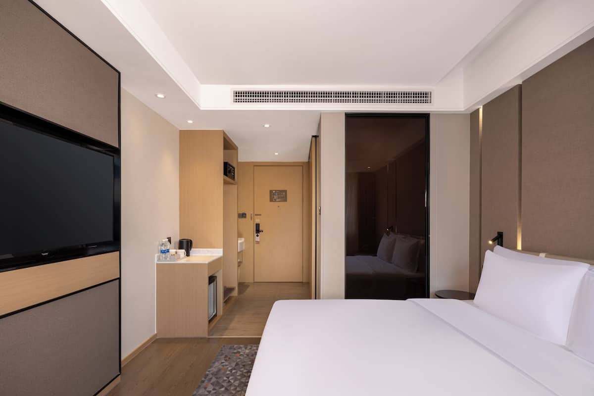 Down comforters, desk, blackout drapes, soundproofing