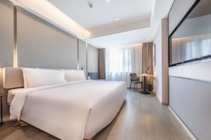 Down comforters, desk, blackout drapes, soundproofing