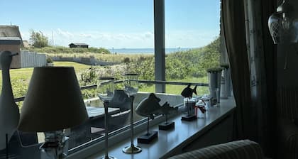 Bright beach apartment with sea view - The apartment is located directly on the beach.