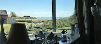 Bright beach apartment with sea view - The apartment is located directly on the beach.