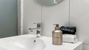 Shower, towels, soap, shampoo