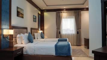 Familiesuite | Premium-sengetøj, pengeskab på værelset, mørklægningsgardiner