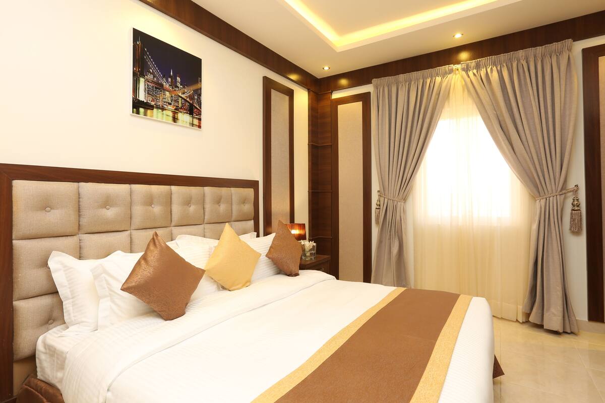 Suíte executiva | 1 quarto, roupas de cama premium, cofres nos quartos, cortinas blackout