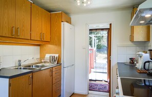 Fridge, stovetop, coffee/tea maker, cookware/dishes/utensils