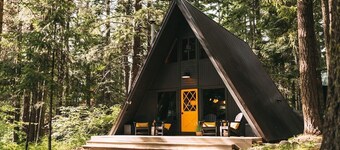 Moonshine Digs is the retro A-Frame of your dreams! Hot tub, record player, games, TVs and peace and quiet all nestled in the heart of the Cascade Mountains with Lake Cle Elum access.