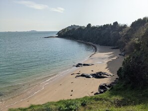 Beach nearby, sun loungers