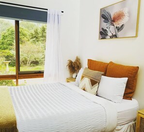 2 habitaciones, tabla de planchar con plancha y cuna de viaje 