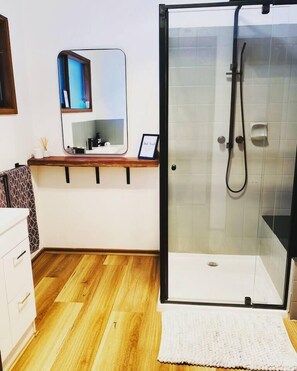 Shower, hair dryer, towels, soap