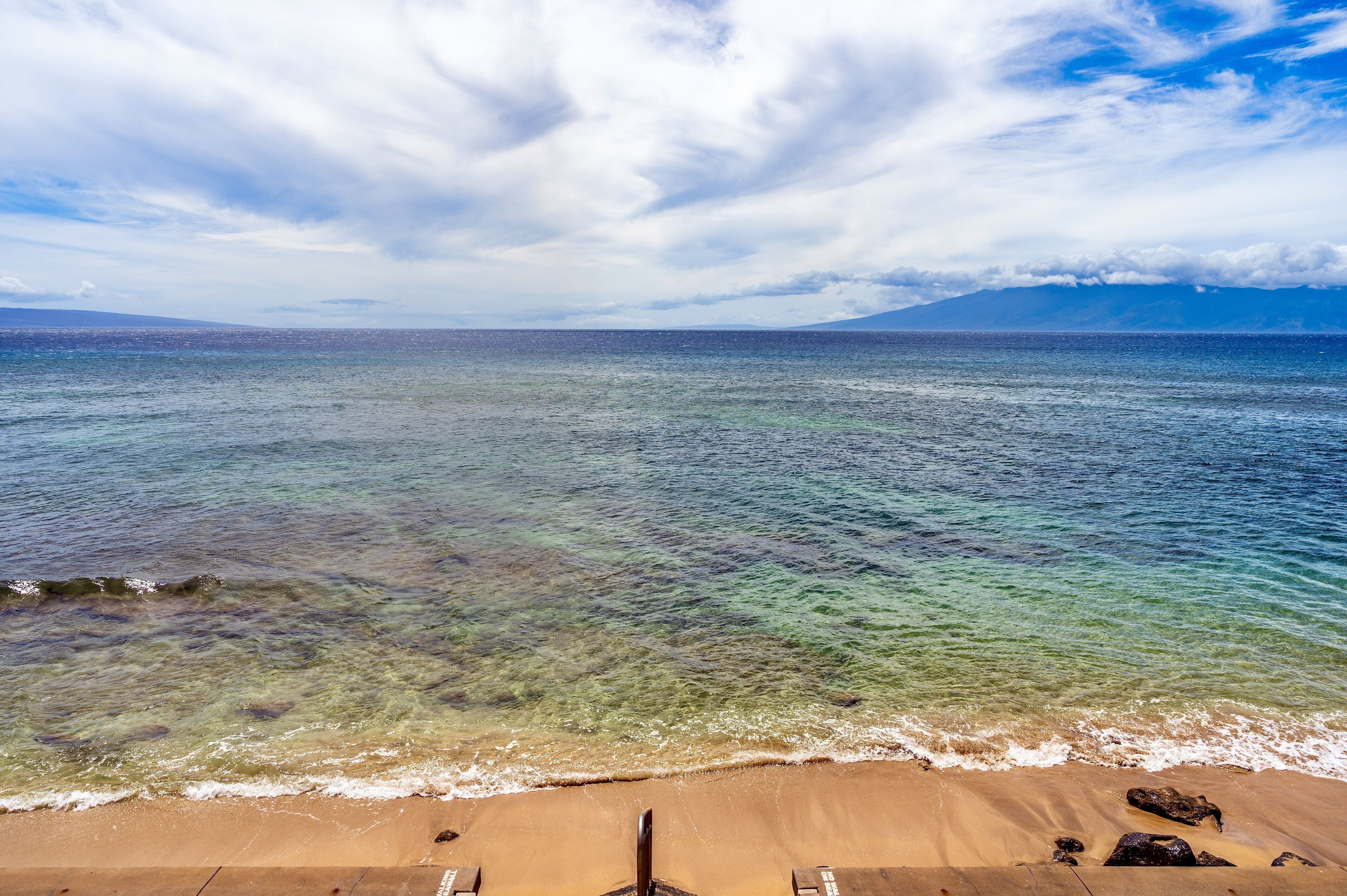 On the beach, sun loungers