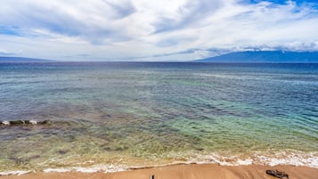On the beach, sun loungers