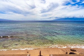 On the beach, sun loungers