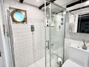 Bathtub, hair dryer, towels, soap