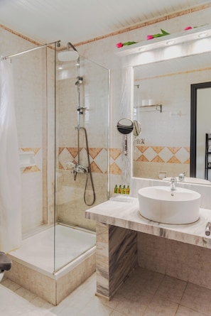 Comfort Room | Bathroom | Shower, rainfall showerhead, hair dryer, towels