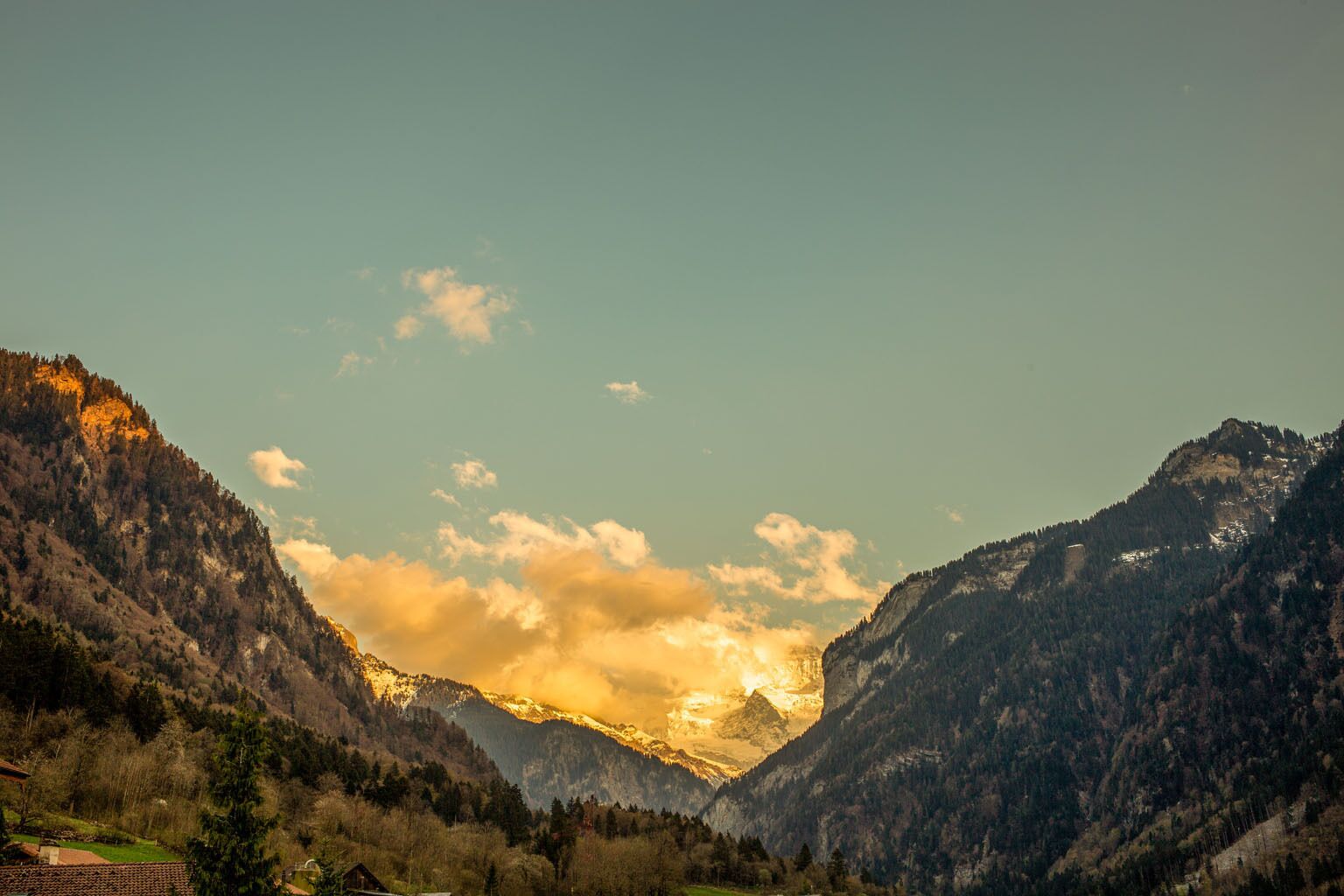 A mountainous landscape with a valley.