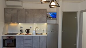 ラグジュアリー アパートメント | 専用キッチン | エスプレッソマシン、コーヒー / ティーメーカー、大型冷蔵庫、オーブン