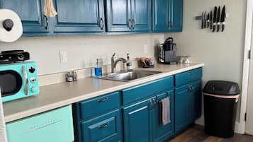 Fridge, microwave, coffee/tea maker, toaster
