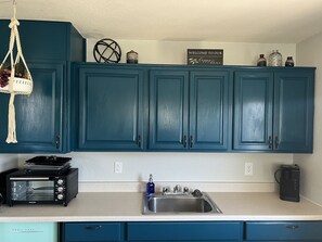 Fridge, microwave, coffee/tea maker, toaster