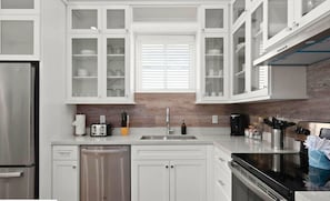 Prepare memorable meals with everything conveniently within reach. - Coastal Getaway for 12 | Private Pool + Beach Access (South Padre Island)