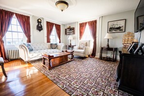 Smart TV, fireplace, books