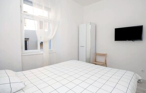 1 quarto, Wi-Fi de cortesia, roupa de cama