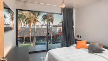 2 bedrooms, blackout drapes, soundproofing, iron/ironing board