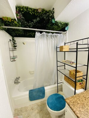 Combined shower/tub