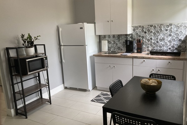 Fridge, microwave, stovetop, coffee/tea maker