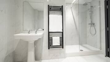 Executive Suite | Bathroom | Shower, rainfall showerhead, designer toiletries, hair dryer
