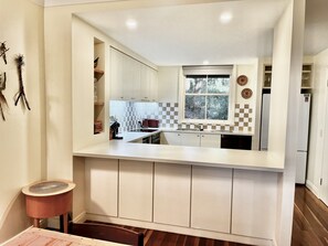 Fridge, dishwasher, cookware/dishes/utensils